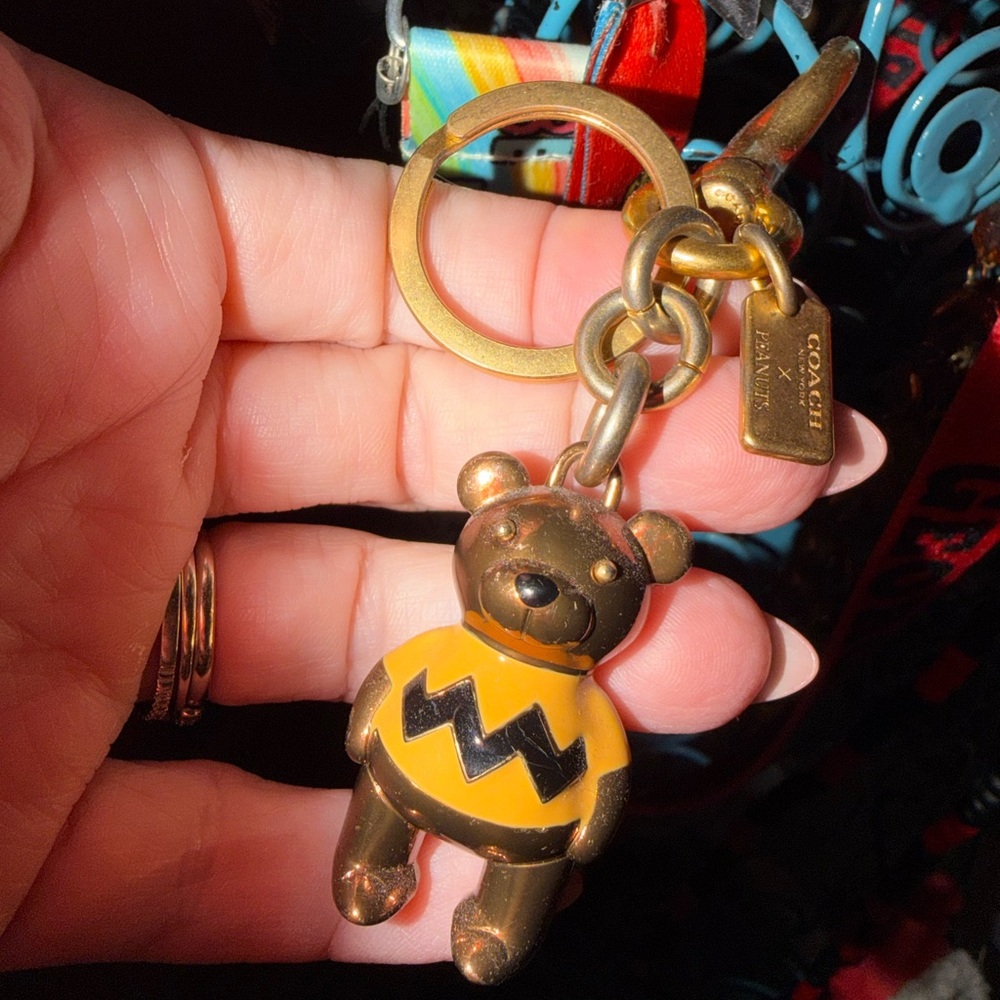 Coach Charlie Brown Bear Keychain with Yellow and Black Sweater